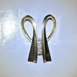 14K yellow gold slide with 3 channel set diamonds 1/3 TCW